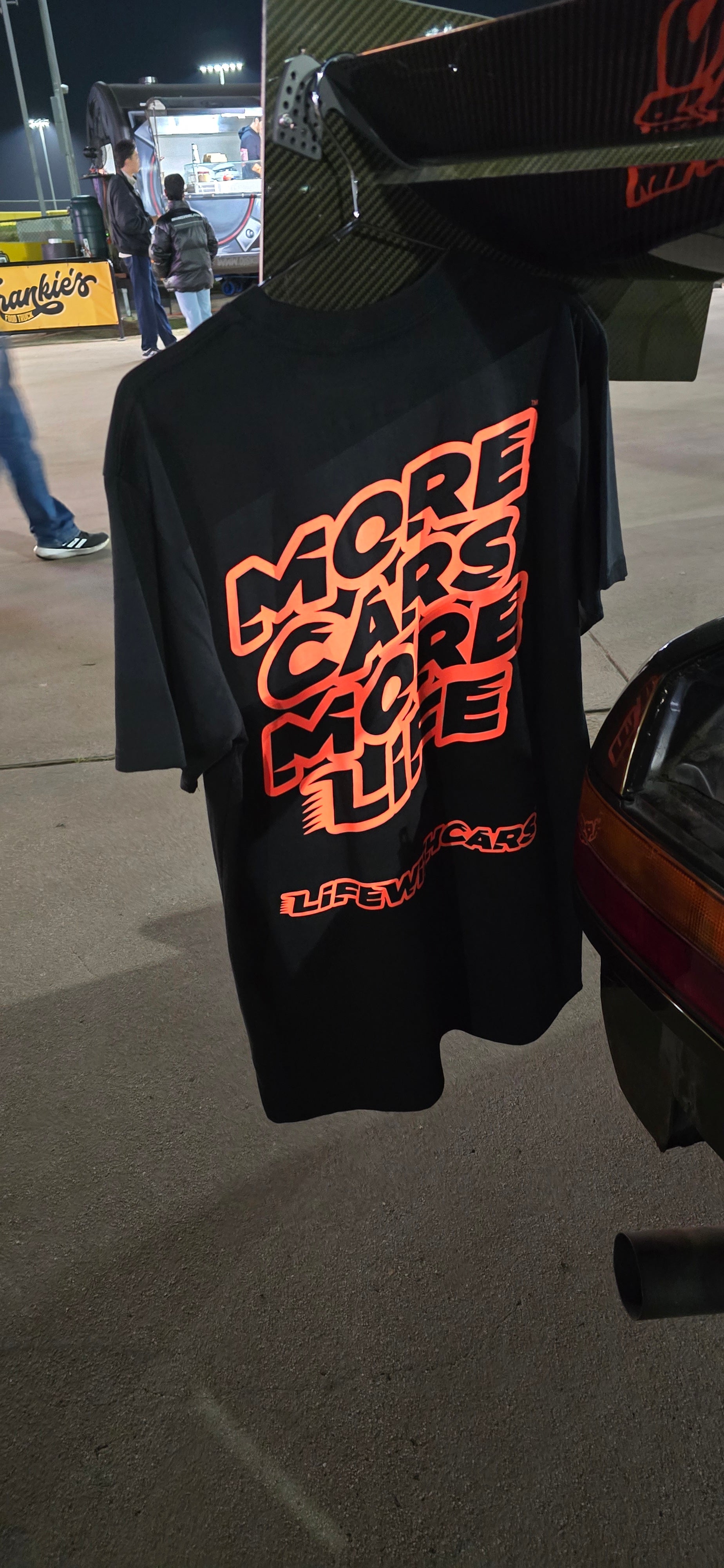 Life With Cars Street Wear T-shirt in Black & Sundail Orange back hanging